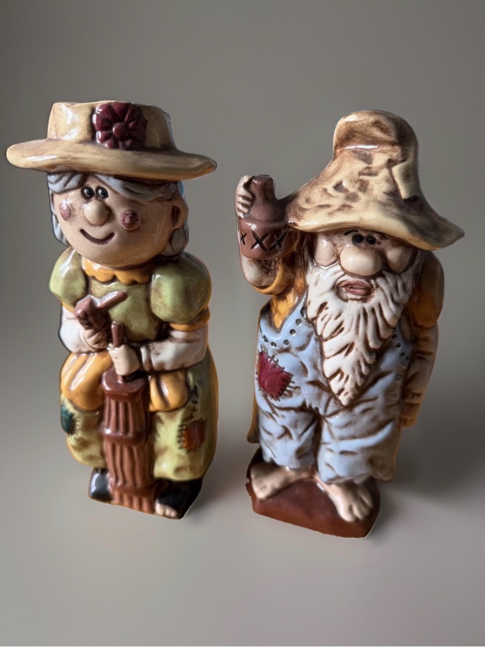 Charming pair of vintage Country Bumpkin / Hillbilly ceramic figurines. 8โ Tall